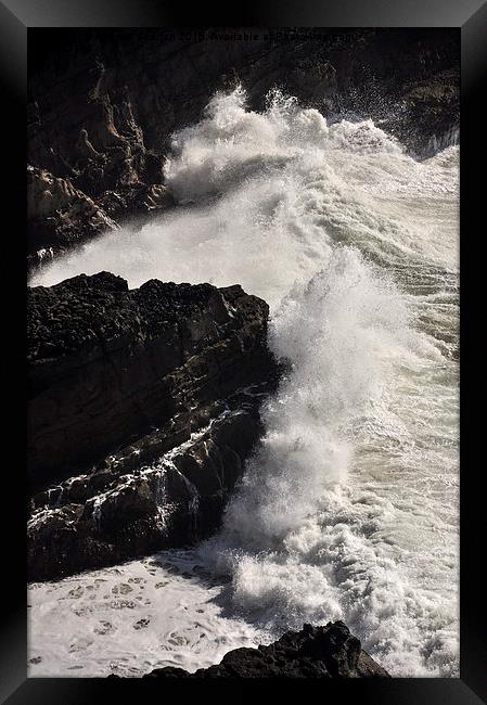  Powerful waves breaking on the rocks  Framed Print by Andrew Kearton