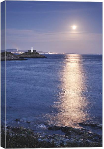 Full moon and lighthouse at Mumbles Head. Wales, U Canvas Print by Liam Grant