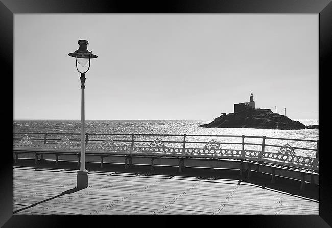 Lighthouse from Mumbles Pier. Wales, UK. Framed Print by Liam Grant