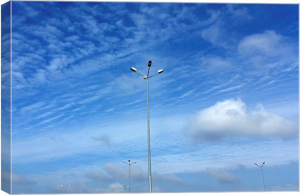  Lamps under  the blue sky Canvas Print by Marinela Feier