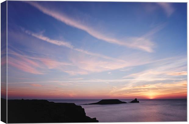 Worms Head at sunset. Wales, UK. Canvas Print by Liam Grant