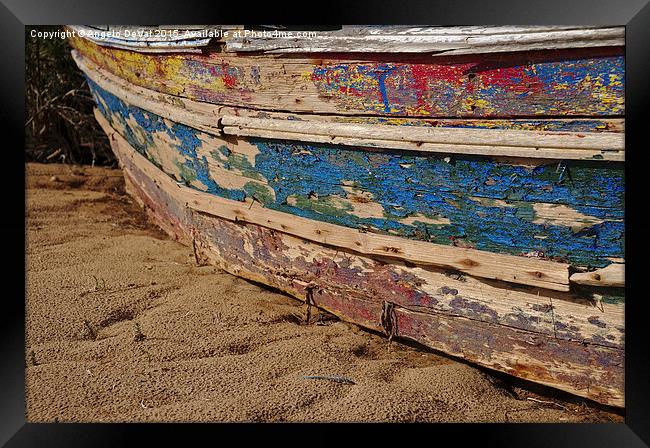 Weathered Fishing Boat Resting on the Sand Framed Print by Angelo DeVal