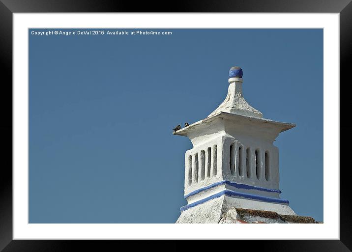 Bird talk on a chimney in Algarve Framed Mounted Print by Angelo DeVal