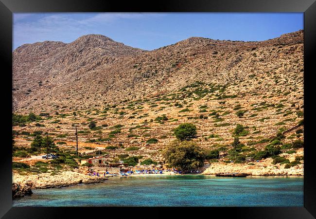 The Beach at Kania Framed Print by Tom Gomez