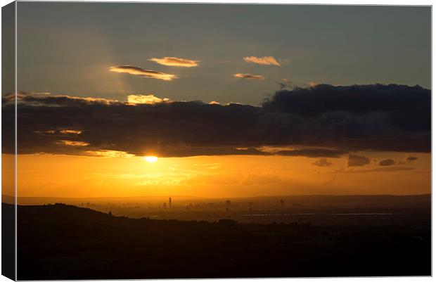 Golden sunset over Manchester Canvas Print by Andrew Kearton