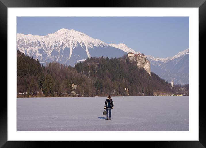 Lake Bled frozen in winter, Slovenia. Framed Mounted Print by Ian Middleton
