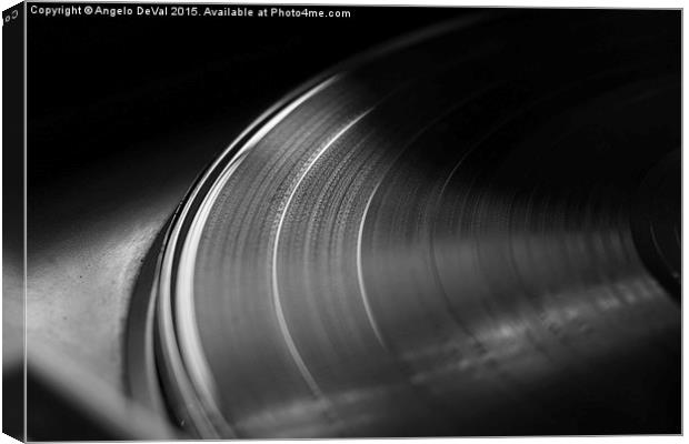 Vinyl record on a turntable. Memory and nostalgia  Canvas Print by Angelo DeVal