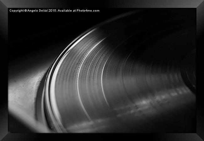 Vinyl record on a turntable. Memory and nostalgia  Framed Print by Angelo DeVal