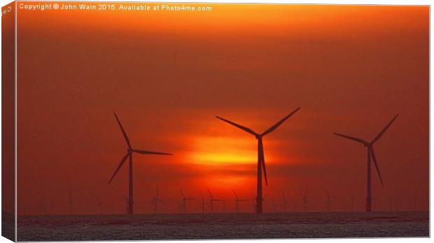 Wind Farm at Sunset Canvas Print by John Wain