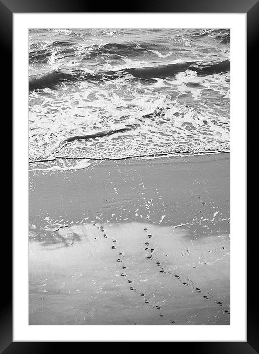 Footprints in the sand. Tenby beach, Wales, UK. Framed Mounted Print by Liam Grant