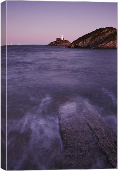 Lighthouse at dusk. Mumbles, Wales, UK. Canvas Print by Liam Grant