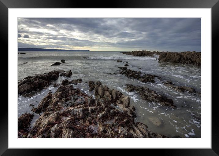 Rocks and Wave Framed Mounted Print by Mike Gorton