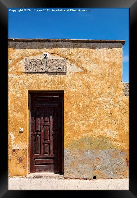  Textured ochre wall, dark red door Tenerife Framed Print by Phil Crean