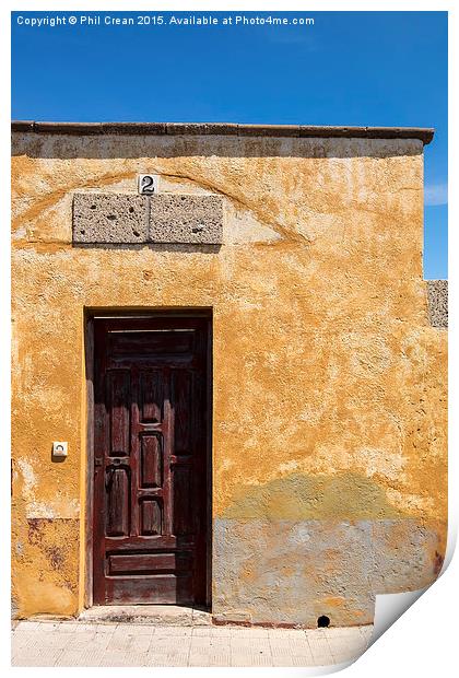  Textured ochre wall, dark red door Tenerife Print by Phil Crean
