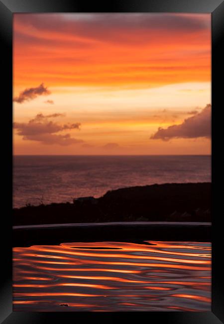 Sunset over a pool overlooking the sea - Curacao C Framed Print by Gail Johnson