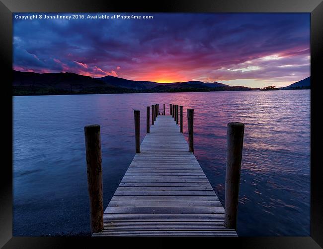Jetty sunset, Derwent water, English Lake District Framed Print by John Finney