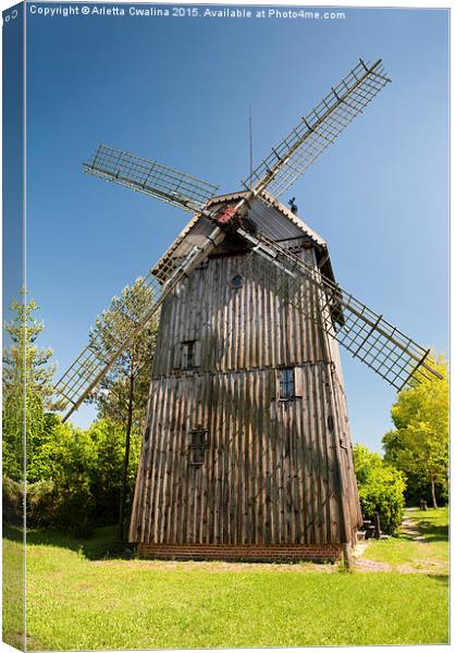 Wooden old windmill house Canvas Print by Arletta Cwalina