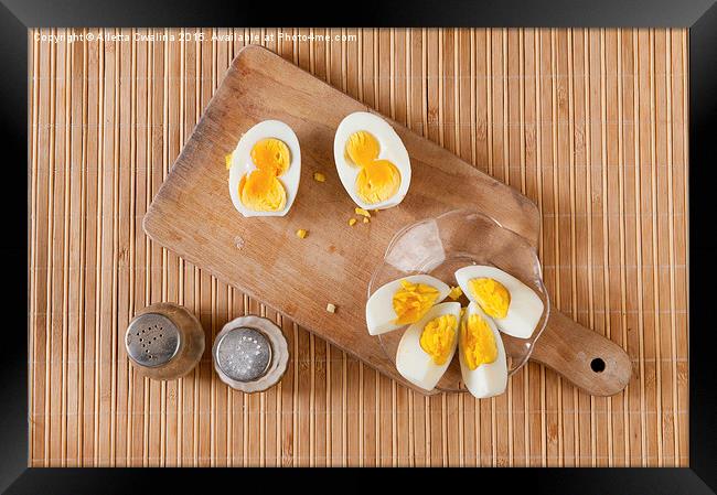 Cut boiled two yolks egg Framed Print by Arletta Cwalina