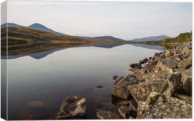  Lochside reflections Canvas Print by Aaron Casey
