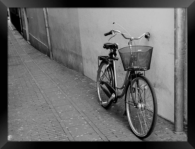  Bike in Amsterdam. Framed Print by Adele Crittenden
