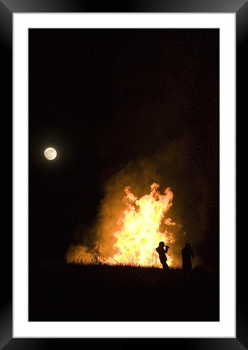 Bonfire on hill in Prezganje, Slovenia Framed Mounted Print by Ian Middleton