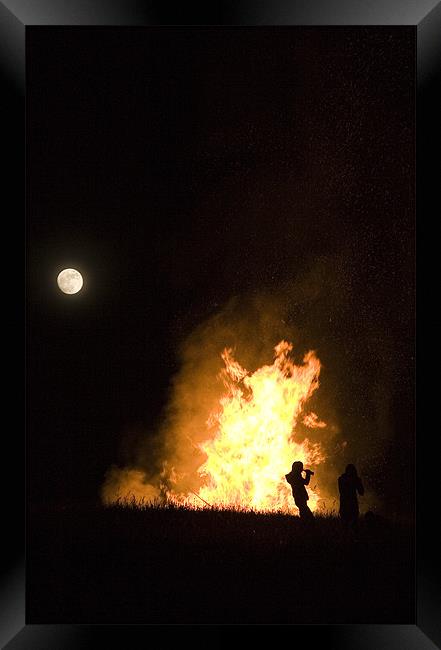 Bonfire on hill in Prezganje, Slovenia Framed Print by Ian Middleton