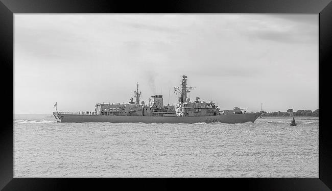 HMS Iron Duke approaches Portsmouth Harbour Framed Print by Malcolm McHugh