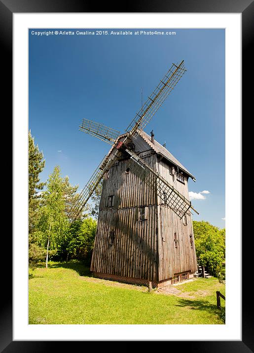 Old wooden windmill building Framed Mounted Print by Arletta Cwalina