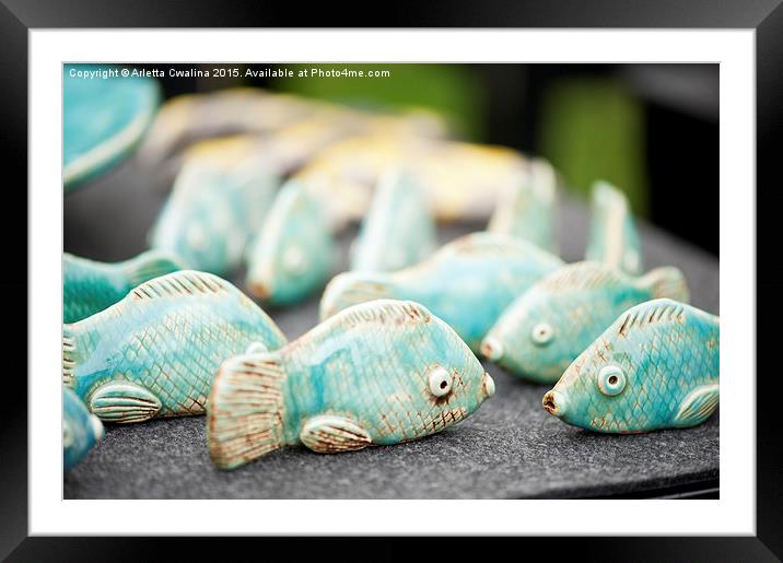 Tiny fish ceramic decorations Framed Mounted Print by Arletta Cwalina