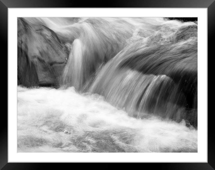 Fluidity in Motion Framed Mounted Print by Tommy Dickson