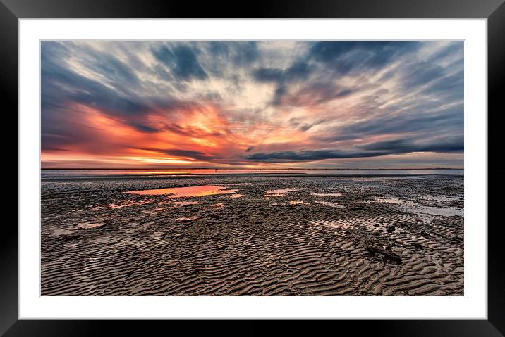 Low tide at sunset Framed Mounted Print by Guido Parmiggiani
