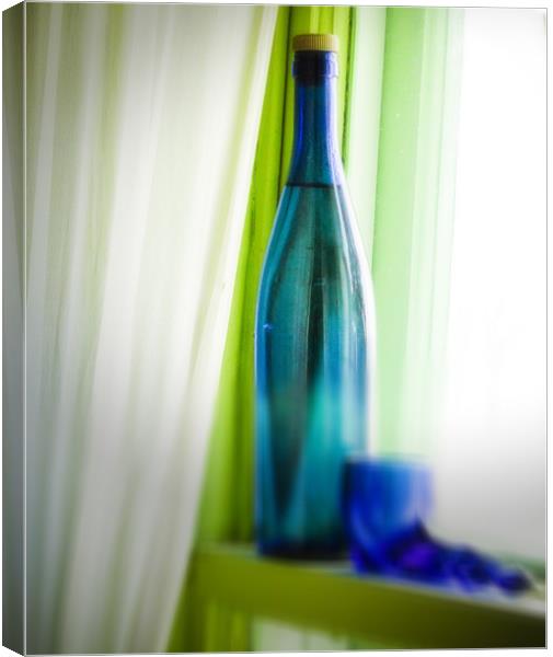 Blue bottle Canvas Print by Jean-François Dupuis