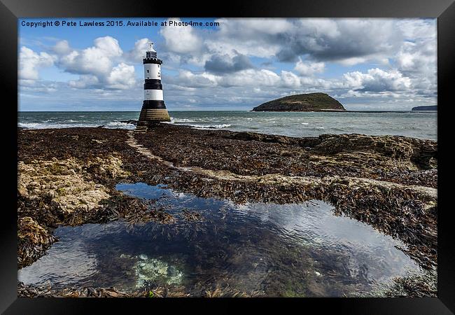  Penmon Lighthouse and rock pool Framed Print by Pete Lawless