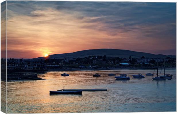 Sunset over Swanage and Purbeck Hills  Canvas Print by Darren Galpin