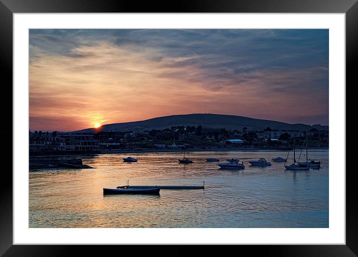 Sunset over Swanage and Purbeck Hills  Framed Mounted Print by Darren Galpin