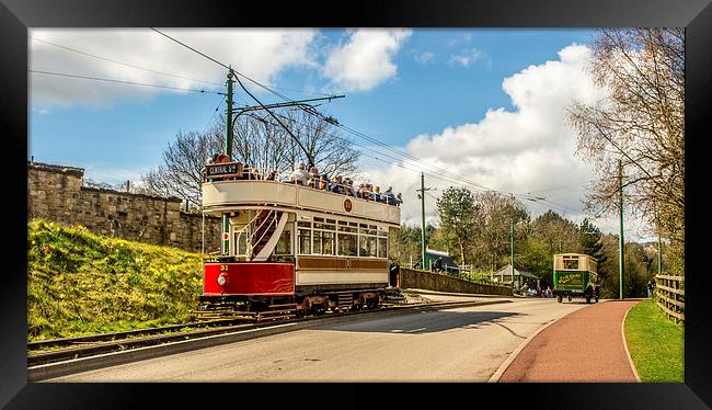  Tram To Town Framed Print by John Ellis