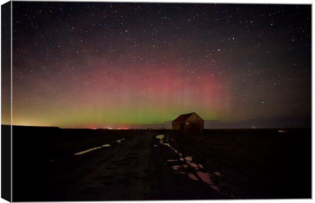 The Northern lights over the old coal barn at Thor Canvas Print by Gary Pearson