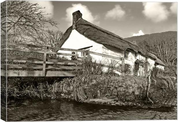 Cottage By The Stream Canvas Print by Mike Gorton