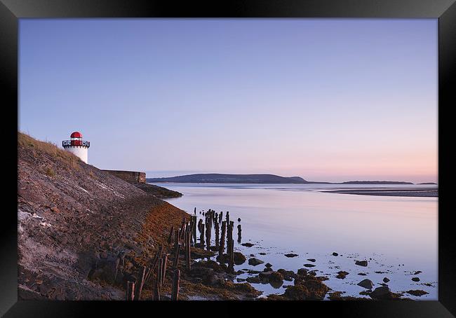 Burry Port lighthouse at twilight. Wales, UK. Framed Print by Liam Grant