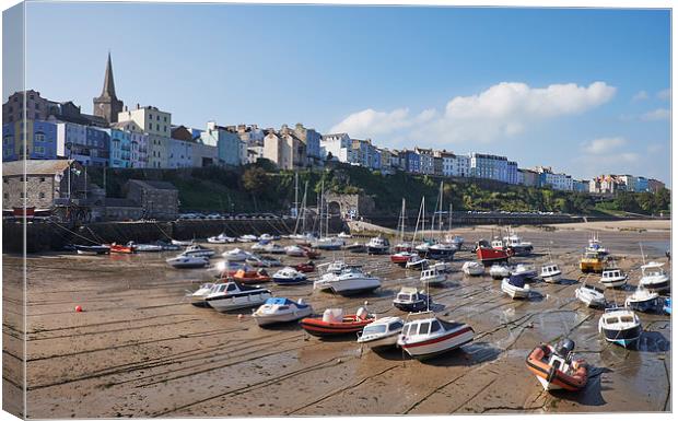 Boats in Tenby Harbour at low tide. Wales, UK. Canvas Print by Liam Grant