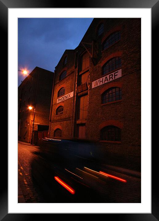 Wapping Taxi Blur Framed Mounted Print by mark blower