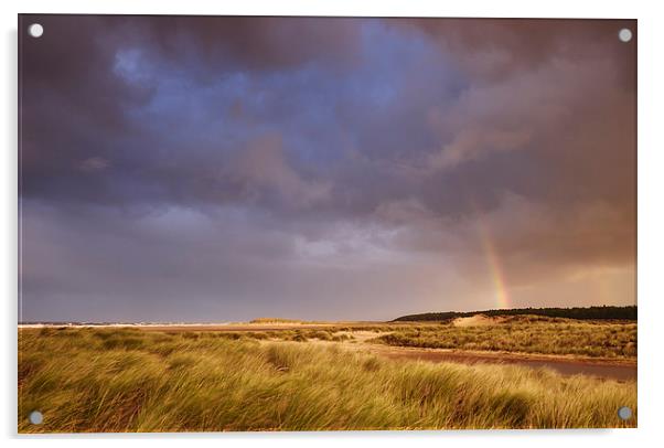 Storm clouds and rainbow at sunset. Holkham, Norfo Acrylic by Liam Grant
