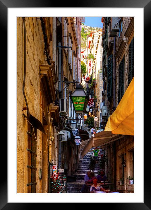 Cafe in a Dubrovnik Alley Framed Mounted Print by Tom Gomez