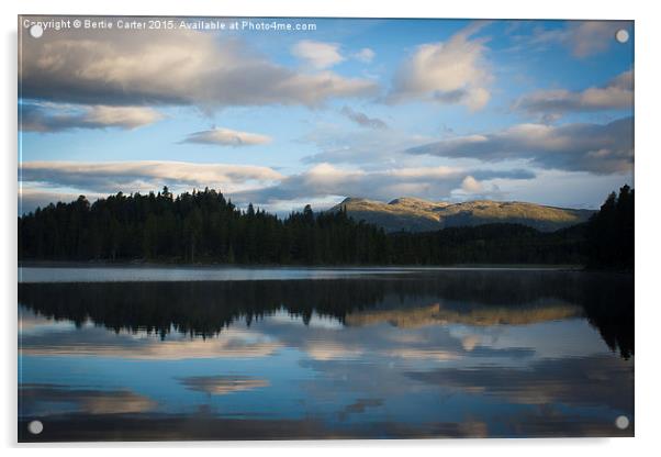 Sun rising on mountains across lake Acrylic by Bertie Carter