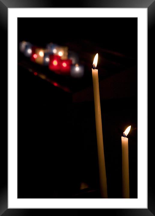 Candles burning in Eglise Saint Pierre d'Arène. Framed Mounted Print by Ian Middleton