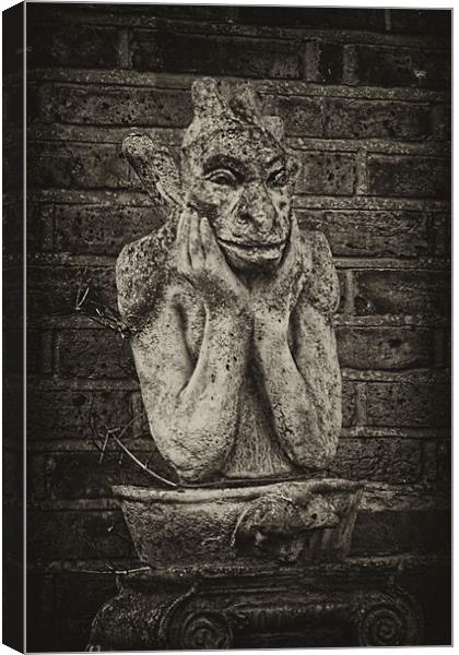 Gargoyle statue Canvas Print by Dave Windsor