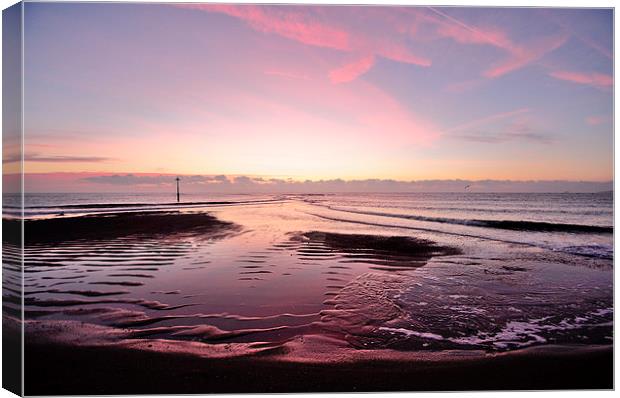  Pink low tide sunrise on Teignmouth Beach Canvas Print by Rosie Spooner