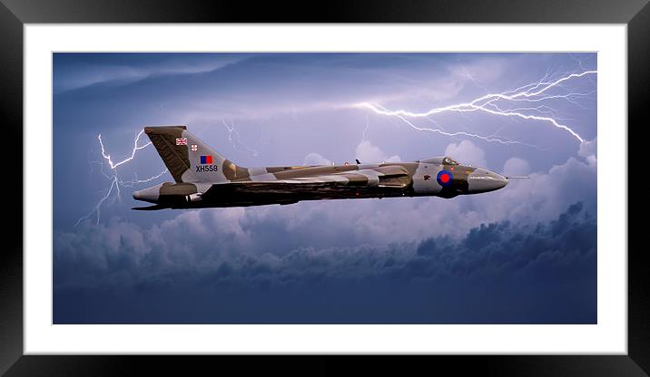 Vulcan Bomber in a Storm Framed Mounted Print by Roger Green