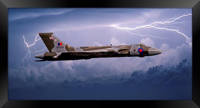 Vulcan Bomber in a Storm Framed Print by Roger Green