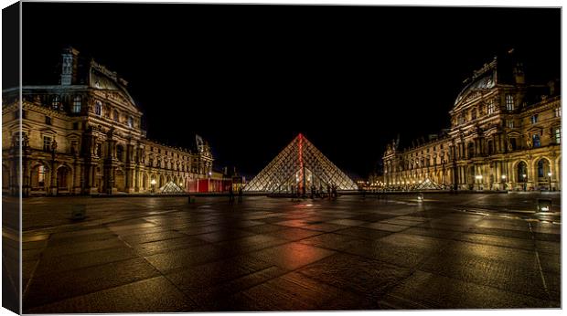  A Wet Night At The Louvre Canvas Print by LensLight Traveler